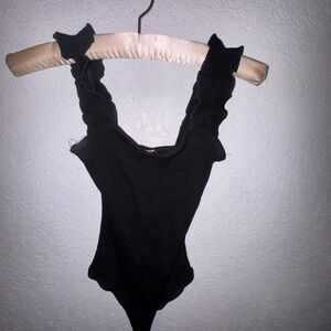 Francesca’s Black body suit